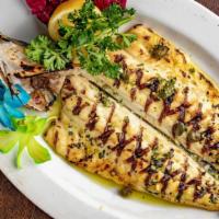 Branzino · Whole Mediterranean Sea Bass, Baked or Grilled, served with a Fresh Herbs Sauce, Garlic, and...