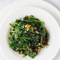 Broccoli Rabe · Sautéed with cherry peppers, garlic and oil