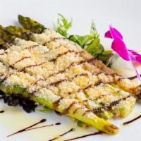 Roasted Asparagus · Asparagus roasted with Cherry Wine and Olive Oil, topped with Parmesan Cheese and served ove...