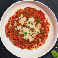 Chief Beef Bolognese Pasta (Spaghetti) · Ground beef cooked in spicy marinara sauce and served with spaghetti. Served with garlic bre...