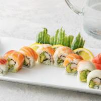Rainbow Roll · Kani, avocado, cucumber, topped with ebi, tuna, salmon, white fish and avocado.