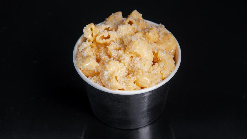 Sam'S Mac N' Cheese · Macaroni in a 3 cheese blended sauce, topped with Parmesan