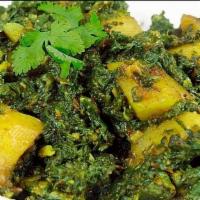 Aloo Palak · Fresh spinach and potato cooked with mild spices and herbs.