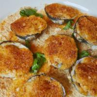 Littleneck Clams · Chorizo baked clams.