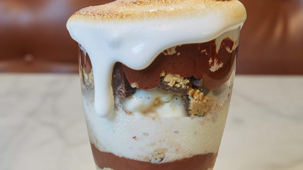 Gatsby'S S'Mores Sundae · Vanilla ice cream, chocolate pieces, graham cracker crumbs, chocolate syrup and toasted marshmallows.