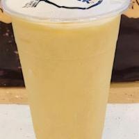 Mango Yogurt Smoothie · Frozen mango, whole milk, and yogurt powder.