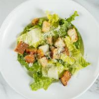 Caesar Salad · Fresh romaine lettuce with seasoned croutons, tomatoes, sprinkled with imported Parmesan che...