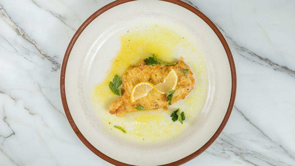 Chicken Francese · Chicken in a lemon and white wine sauce. Served with your choice of pasta or salad.