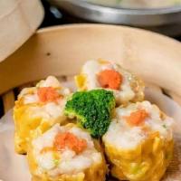 Shui Mai (3 Pieces) / 燒賣 · Handmade dumplings filled with shrimp, pork and wood ear mushrooms, topped with tobiko. Wrap...