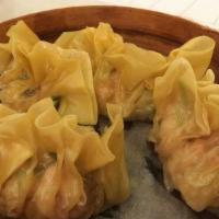 Pork & Carrot Dumpling (3 Pieces) / 魚翅餃 · It's a dumpling filled with grounded pork and carrot.