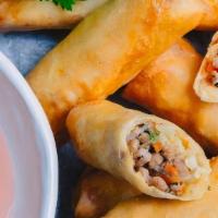 Thai Spring Rolls (3 Pieces) · Three pieces. Fried vegetarian rolls with plum sauce.