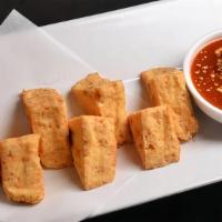 Fried Tofu · Fried fresh tofu with sweet chili sauce and peanuts.