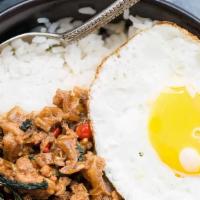 Thai Basil Minced Chicken · This classic Thai dish of ground chicken, basil leaves, and Thai chilies with one fried egg ...