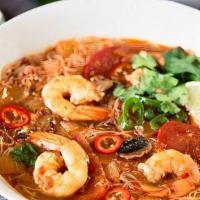 Tom Yum Noodle Soup · Noodle and mixed vegetable in a spicy sweet and sour broth. Choice of rice noodle, egg noodl...