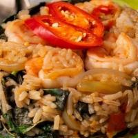 Tom Yum Fried Rice · Sautéed rice with egg, onion, bell peppers, scallion and string bean. Hot and spicy.