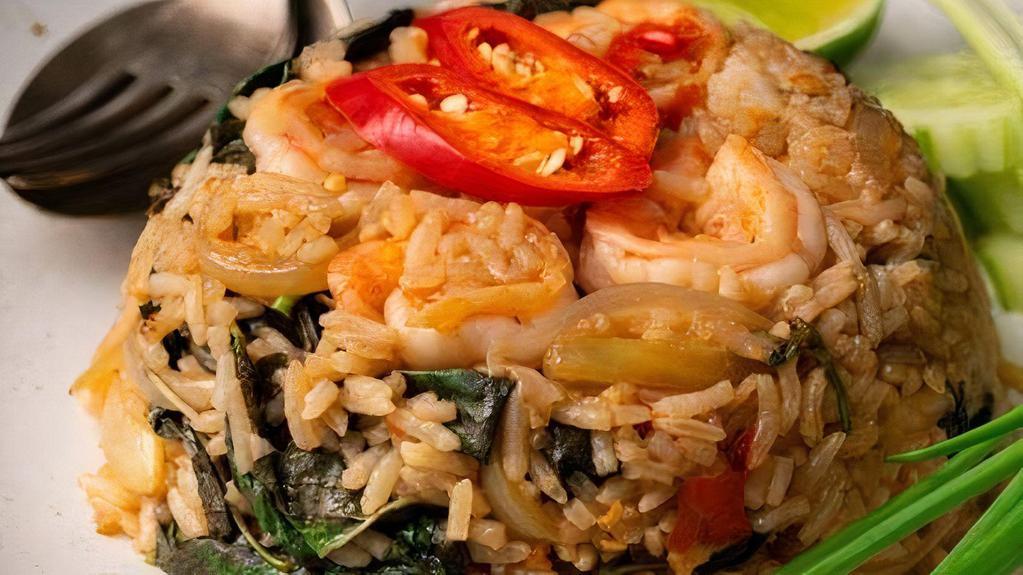 Tom Yum Fried Rice · Sautéed rice with egg, onion, bell peppers, scallion and string bean. Hot and spicy.