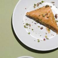 Baklava · Homemade Afghan style rice pudding. Garnished with minced pistachios.