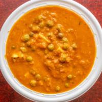 Matar Paneer · Indian cheese cooked with peas, onion in tomato sauce.