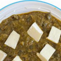 Shahi Paneer · Indian cheese cubes cooked in creamy sauce.
