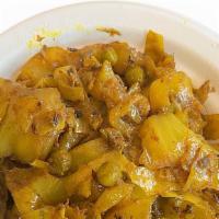Cabbage Matar · Cabbage cooked with spice and herbs.