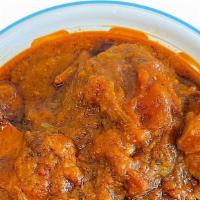 Chicken Karahi · Boneless chicken cooked in curry sauce.