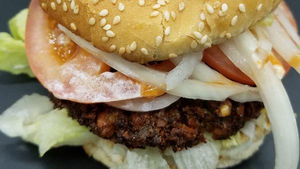 Falafel Burger · Comes with lettuce, tomato, onion, pickle,  mayo, ketchup.