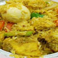 Chicken Biryani · Boneless chicken, healthy herbs and spices cooked with rice and  an egg