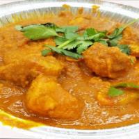 Chicken Madras · Served with rice or bread. Base gravy. Onion sauce, tandoori paste, coconut with Indian herb...