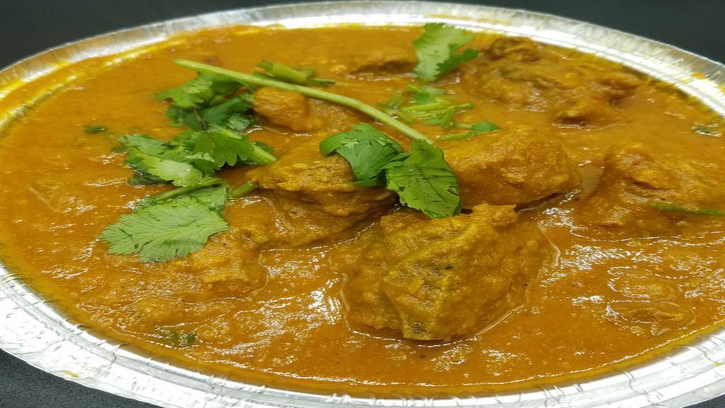 Goat Curry · Base gravy. Onion sauce, Indian herbs and spices