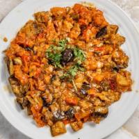 Sauced Eggplant Salad · Small pieces of eggplant in moderately sauce of fresh tomatoes, peppers, onions, garlic and ...