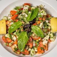 Shepherd'S Salad · Fresh tomatoes, cucumbers, parsley and onions mied in red vinegar and olive oil