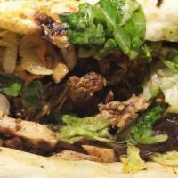 Chicken Gyro · Chicken version of cut in thin slices the famous Gyro served with rice and salad.