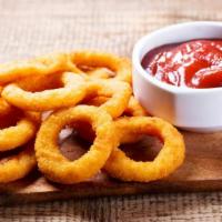 Onion Rings · Golden-crispy onion rings salted to perfection.