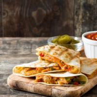 Chicken Quesadilla Sandwich · Mouthwatering sandwich made with strips of grilled chicken, a blend of melted cheeses, onion...
