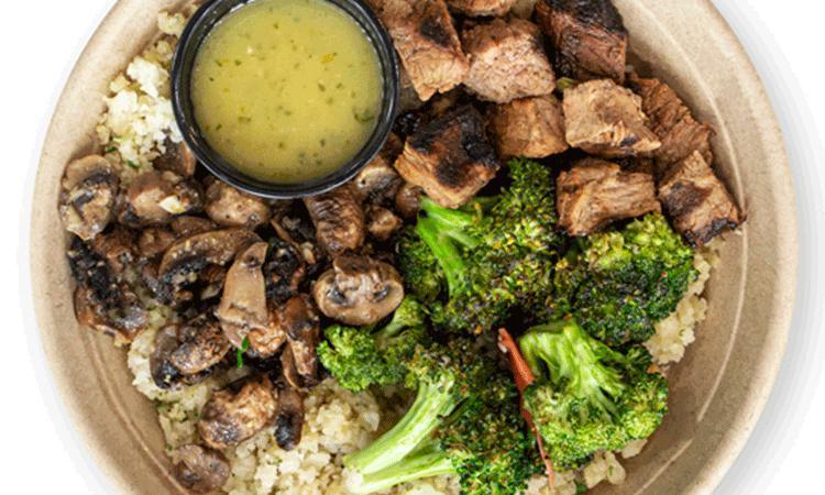 Keto Surfer Bowl · Cauliflower Rice, Sesame Ginger Broccoli, Roasted Mushrooms, Grilled steak, w/ Cilantro Vinaigrette Dressing
