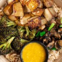 Veggie Vacay Bowl · Coconut Rice, Sesame Ginger Broccoli, Roasted Mushrooms,  Roasted Tofu, w/ Coconut Sweet Pot...