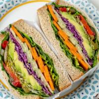  18. Garden Delight · Avocado, sprouts, romaine lettuce, tomatoes, carrots, cucumbers, sweet peppers, and red cabb...