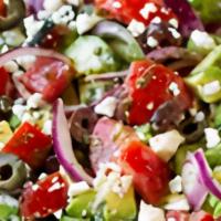 Greek Salad · Iceberg lettuce, tomatoes, cucumbers, peppers, feta cheese, Greek olives, onions, stuffed gr...