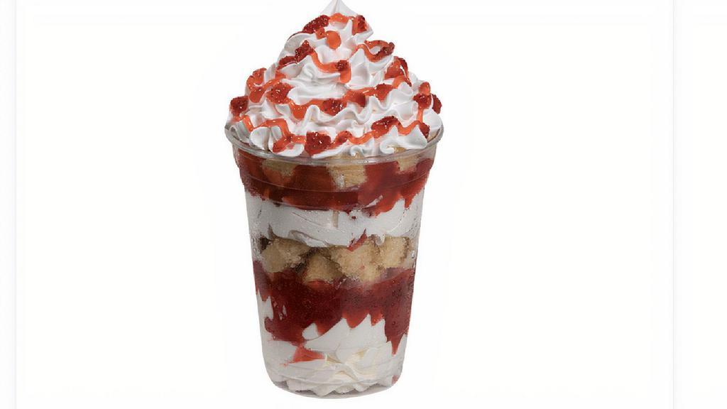 Strawberry Shortcake Sundae Dasher · Layers of vanilla ice cream, strawberries, and pound cake topped with whipped cream and strawberry drizzle.