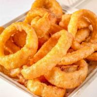 Onion Rings · Golden brown fried onion rings, cooked to perfection.