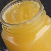Jugo De Naranja Exprimido, Fresh Orange Juice · Fresh squeezed orange juice.