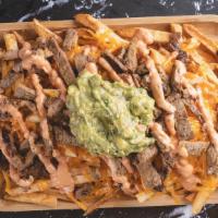 Queens Night Market Fries · French fries, grilled steak, guacamole, cheddar cheese and special sauce.
Papas fritas, carn...