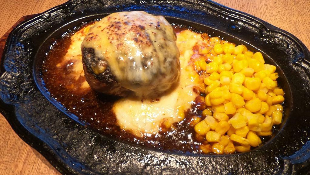 Demi Cheese Hamburger Steak · 9oz original beef patty hamburger steak with melted cheese on top and demiglace sauce. Rice, corn and corn cream soup are included. Definitely the most popular item at Lunch time.