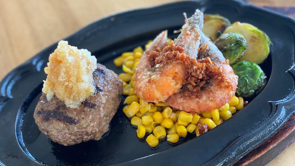 Hamburger Steak & Garlic Shrimp · 5oz original hamburger steak with 2pc Garlic shrimp.
Choose your hamburger patty style from Demi-glace sauce(Free), Japanese grated radish and ponzu sauce(Free), and Demi-Cheese(+$0.50).
Corn, sauteed brussel sprout, rice, corn cream soup are included.