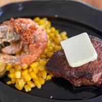 Ny Steak & Garlic Shrimp · 5oz NY sirloin steak with 2pc Garlic shrimp.
corn, sauteed brussel sprout, rice, butter, cor...