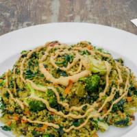 Sautéed Vegetable Quinoa · With bell peppers, broccoli, brussell sprouts, shredded carrots, onions topped with special ...