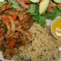 Vegan Ginger Chik'N · Vegan Ginger Chik'N served with basmati spinach rice pilaf cooked with coconut cream and spi...