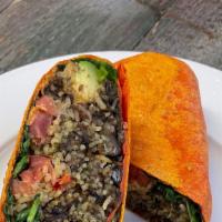 Vegan Burrito · Organic basmati rice, black beans, avocado, tomatoes, spinach, soy protein served with our v...