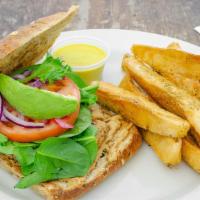 Salmon Burger Deluxe · Wild salmon served with spinach, tomatoes, red onion on a multi grain bun with aioli sauce. ...