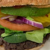 Veggie Burger · Deluxe veggie burger with tomatoes, spinach, avocado, onion, with vegan cashew chipotle sauce.